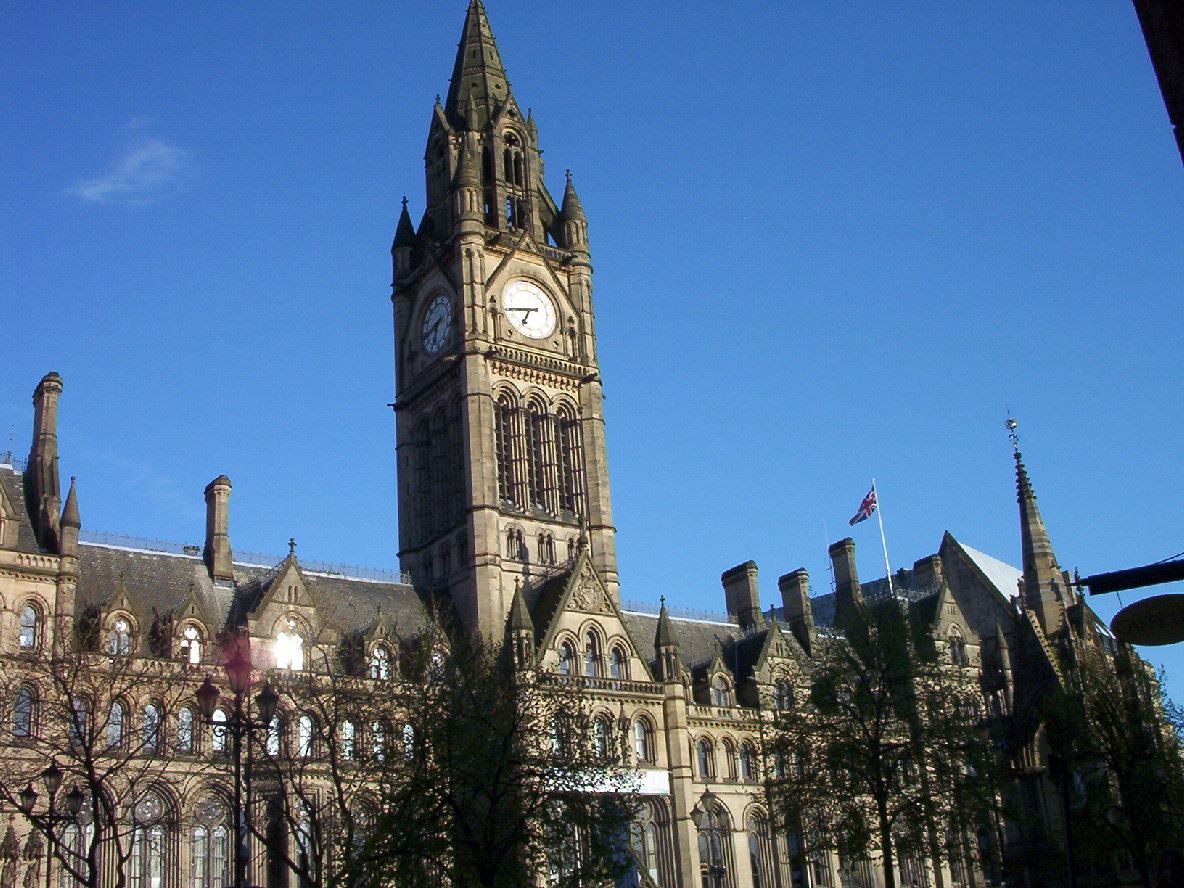 The Gothic revival clock tower and facade of Manchester Town Hall
